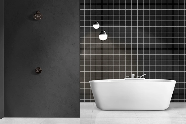 Azulejos baño Valencia con revestimiento moderno en pared y bañera de diseño